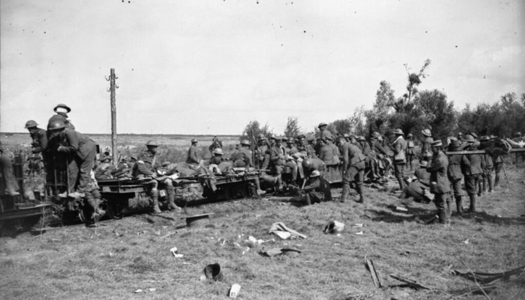 240_Wounded being taken back on light railway. Advance East of Arras. October, 1918.